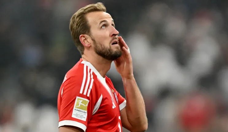 Kane Rues Missed Chances as Bayern's Invincible Hopes Crumble in Augsburg Shock